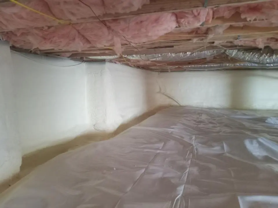 Crawl space encapsulation with closed-cell spray foam for Commercial Roof Restoration in Eastmont